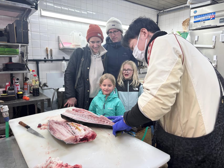 Kyoto: Enjoy Sushi & Market Tour! Best for Family & Couple! - Nishiki Market fish cutting, where your sushi starts