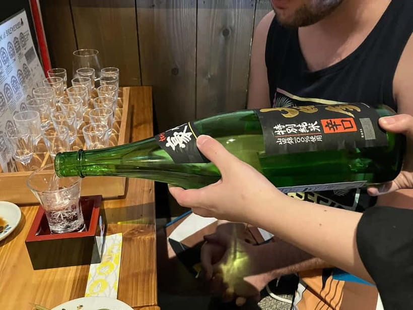 Kyoto: Fushimi Sake District Tour with Boat Ride - The Jikkoku-bune canal cruise, where the story moves slowly