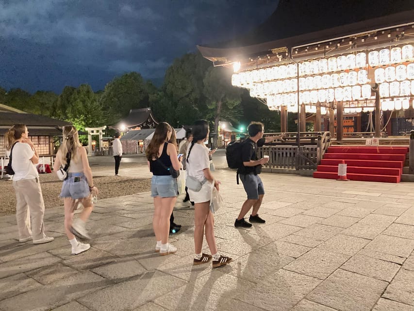 Kyoto: Gion Evening Walk with Hidden Gems, Geisha & Sake - Ninenzaka cobblestones and traditional lanes after dark