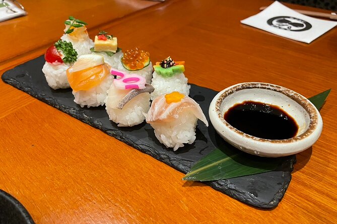 Kyoto: Gion Food Tour 13 Dishes at 4 Eateries - Stop 3 in Gion: lantern streets, sake, and sweet final bites