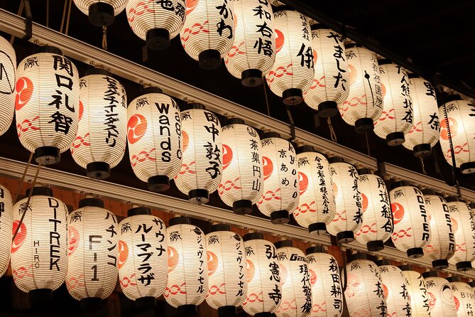 Kyoto Gion Night Tour: Discover Geisha District and Hidden Gems - Stop 1: Hanamikoji Street, the lantern-lit chance for geisha and maiko