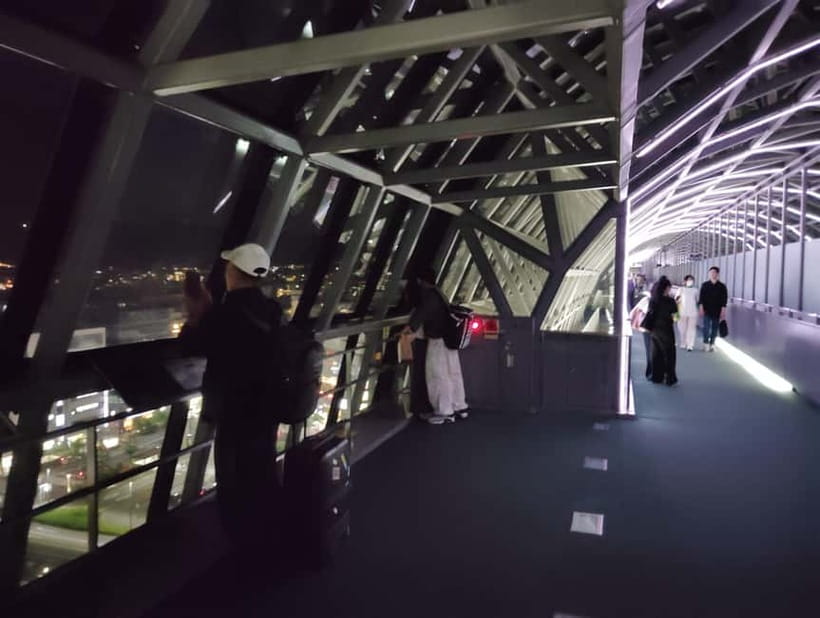 Kyoto: Station and Tower Night Tour with Light Show - Kyoto Tower at night: reading Kyoto from above