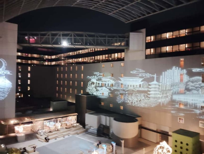 Kyoto: Station and Tower Night Tour with Light Show - Rainy-night strategy: how to make wet streets work for you
