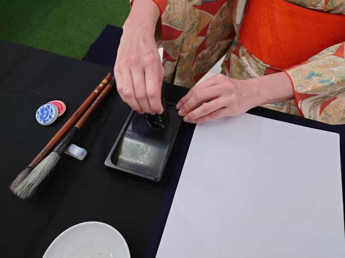 Kyoto: Sumi Ink and Brush Calligraphy Experience - Grinding sumi ink with the inkstone: the part most people skip