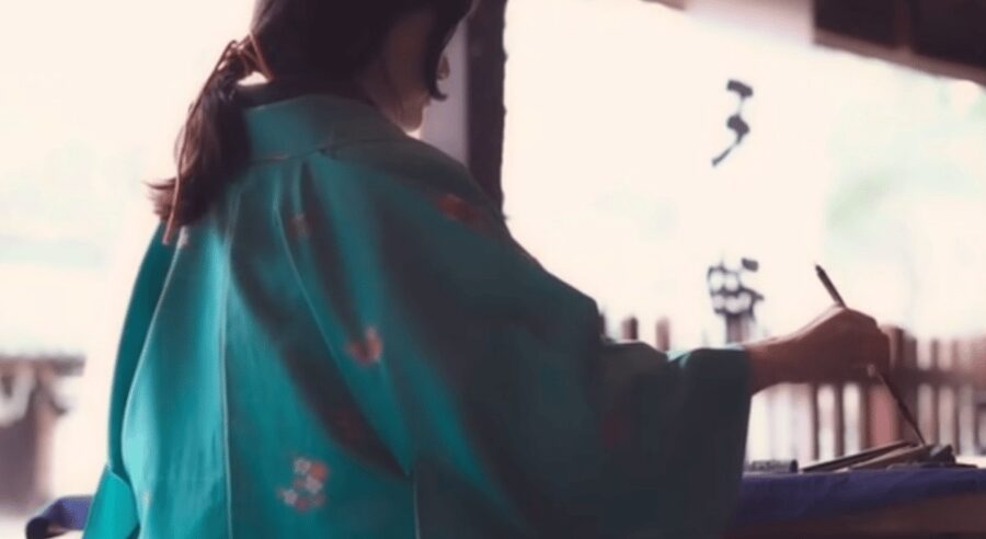 Kyoto: Sumi Ink and Brush Calligraphy Experience - Writing kanji 竹 and 和 to finish the piece