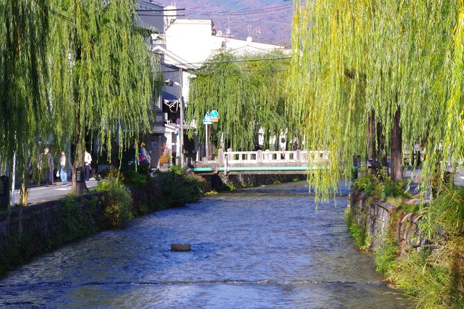 SHIRAKAWA Japanese Culture Experiences with private English staff - Calligraphy practice, kanji shapes, and a personal hanging scroll